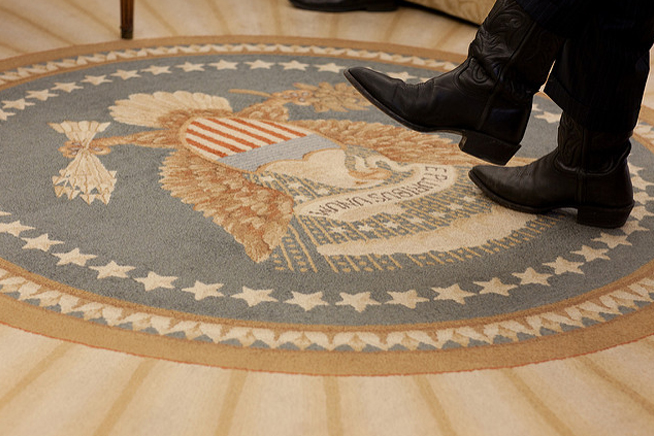The boots of Office of Management and Budget Director Peter Orszag during a meeting with President Barack Obama in the Oval Office, Feb. 16, 2010. (Official White House Photo by Pete Souza)